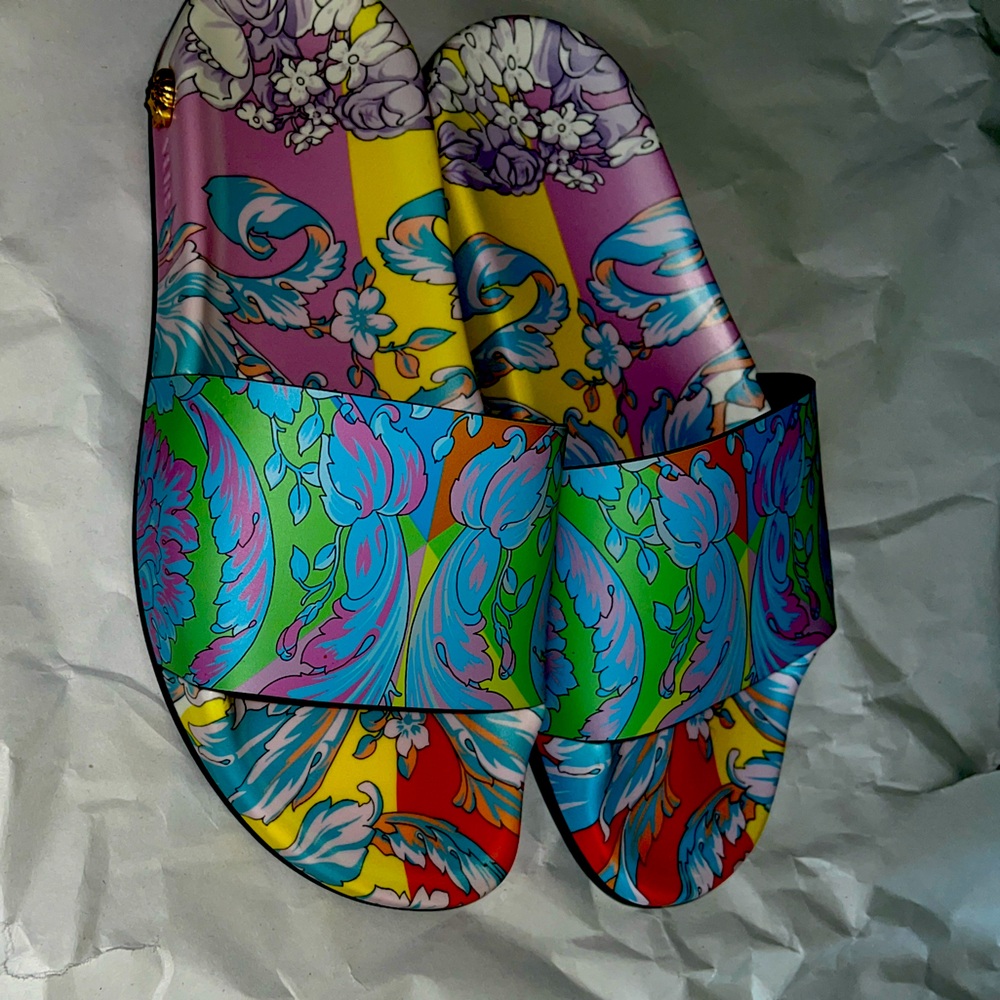 New Versace slippers for sale.
